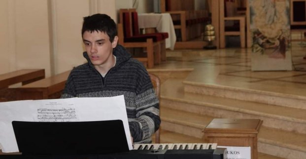 Харьковский пианист Святослав Ковтун играет на концертах в Литве
